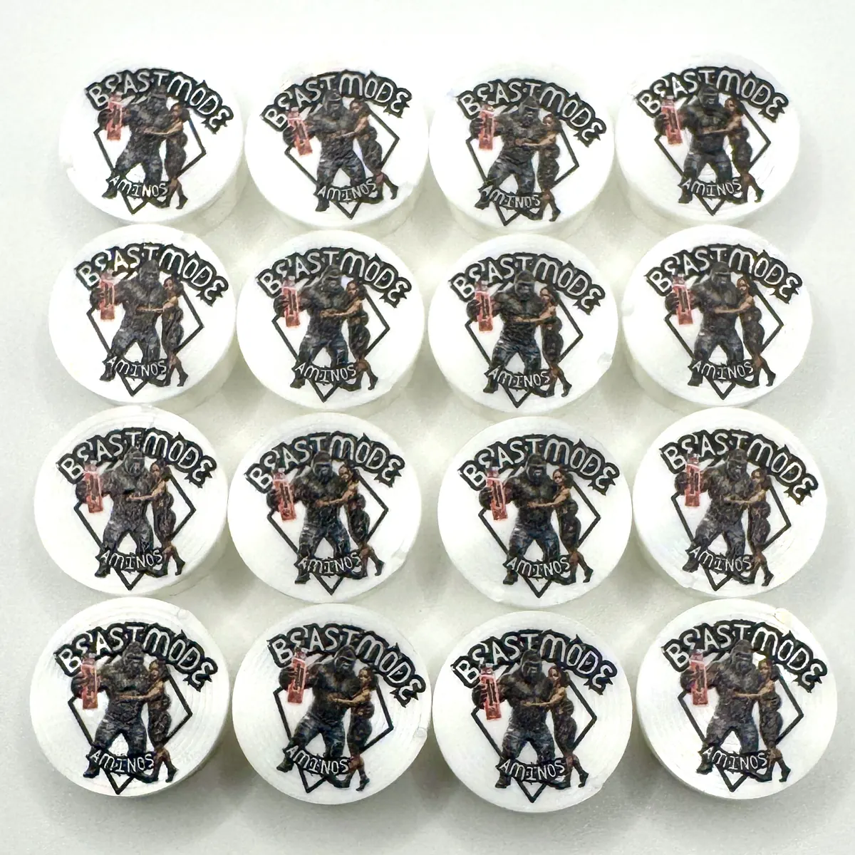 White caps with a full-color Beastmode graphic print