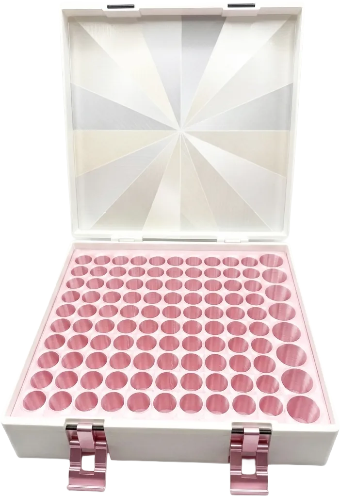 White vial box open, showing a pink vial holder and starburst lid