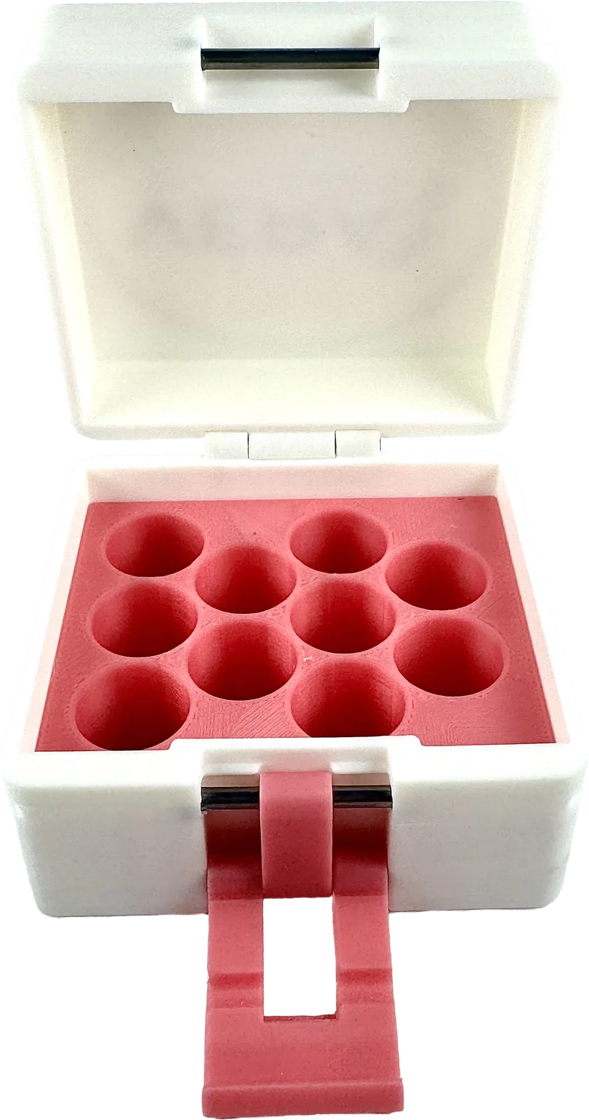 White vial box open, showing a red vial holder inside